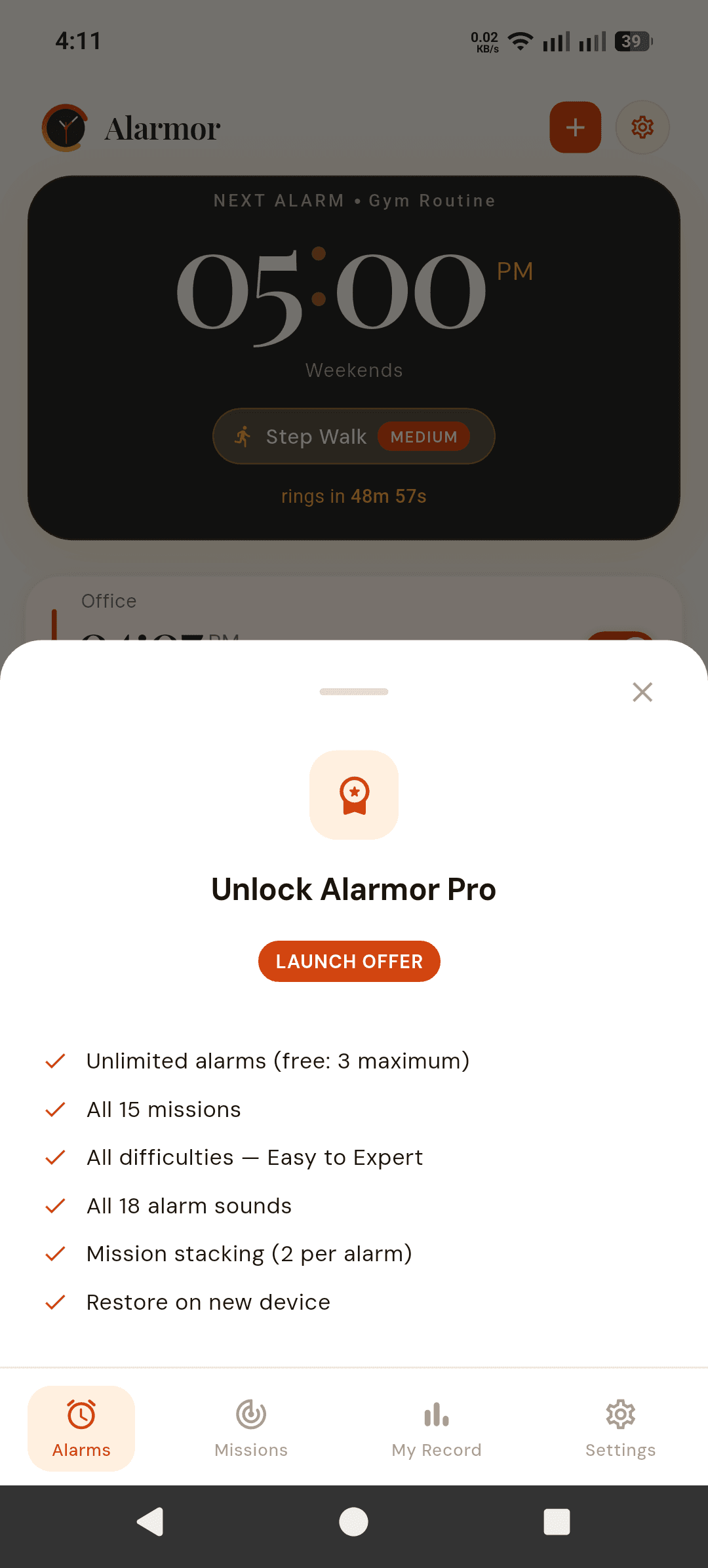Alarmor Pro upgrade sheet listing unlimited alarms (free: 3 maximum), all 15 missions, all difficulties Easy to Expert, all 18 alarm sounds, mission stacking (2 per alarm) and restore on new device